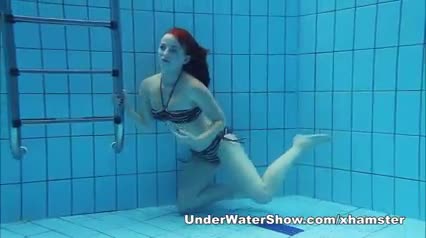 Redheaded Cutie Swimming Nude In The Pool - Watch Latest Porn Video at ePornHome.com for Free.